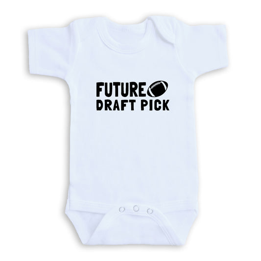 A white baby onesie with the text "FUTURE DRAFT PICK" printed on it.