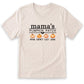 A white t-shirt with a graphic design featuring three pumpkins and the text "mama's PUMPKIN PATCH" along with the names "Myna, Lucy, John".