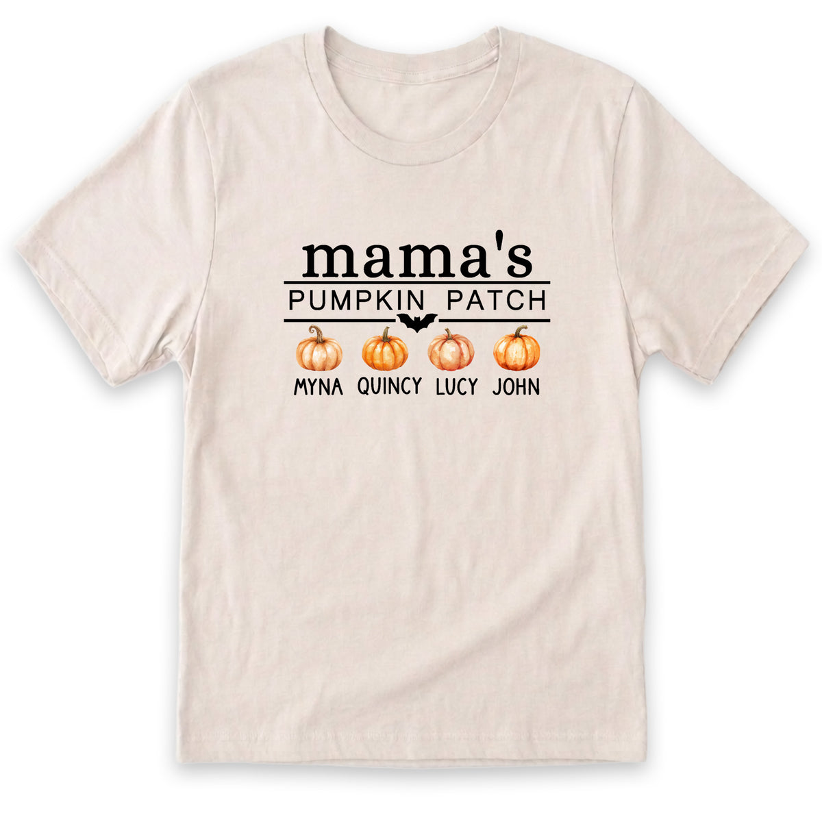 A white t-shirt with a graphic design featuring three pumpkins and the text "mama's PUMPKIN PATCH" along with the names "Myna, Lucy, John".
