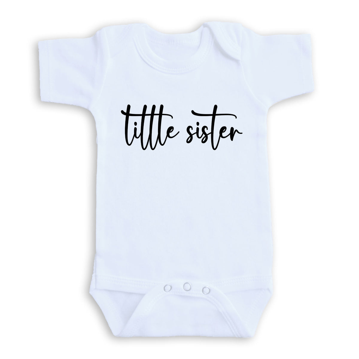 A white baby onesie with the text "title sister" printed on it.