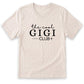 A beige t-shirt with the text "the cool GIGI club" printed on it in a casual, handwritten style.