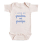 A baby onesie with the text "I LOVE MY GRANDMA AND GRANDPA" printed on it.