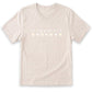 A beige t-shirt with the text "in my garden era" printed on it, along with small white flowers.