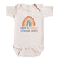 A baby onesie with a rainbow graphic and the text "rain or shine always mine" printed on it.