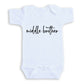 A white baby onesie with the text "middle brother" printed on it.