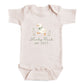 A baby onesie with a cartoon duck and the text "Lucky Duck est. 2027" printed on it.