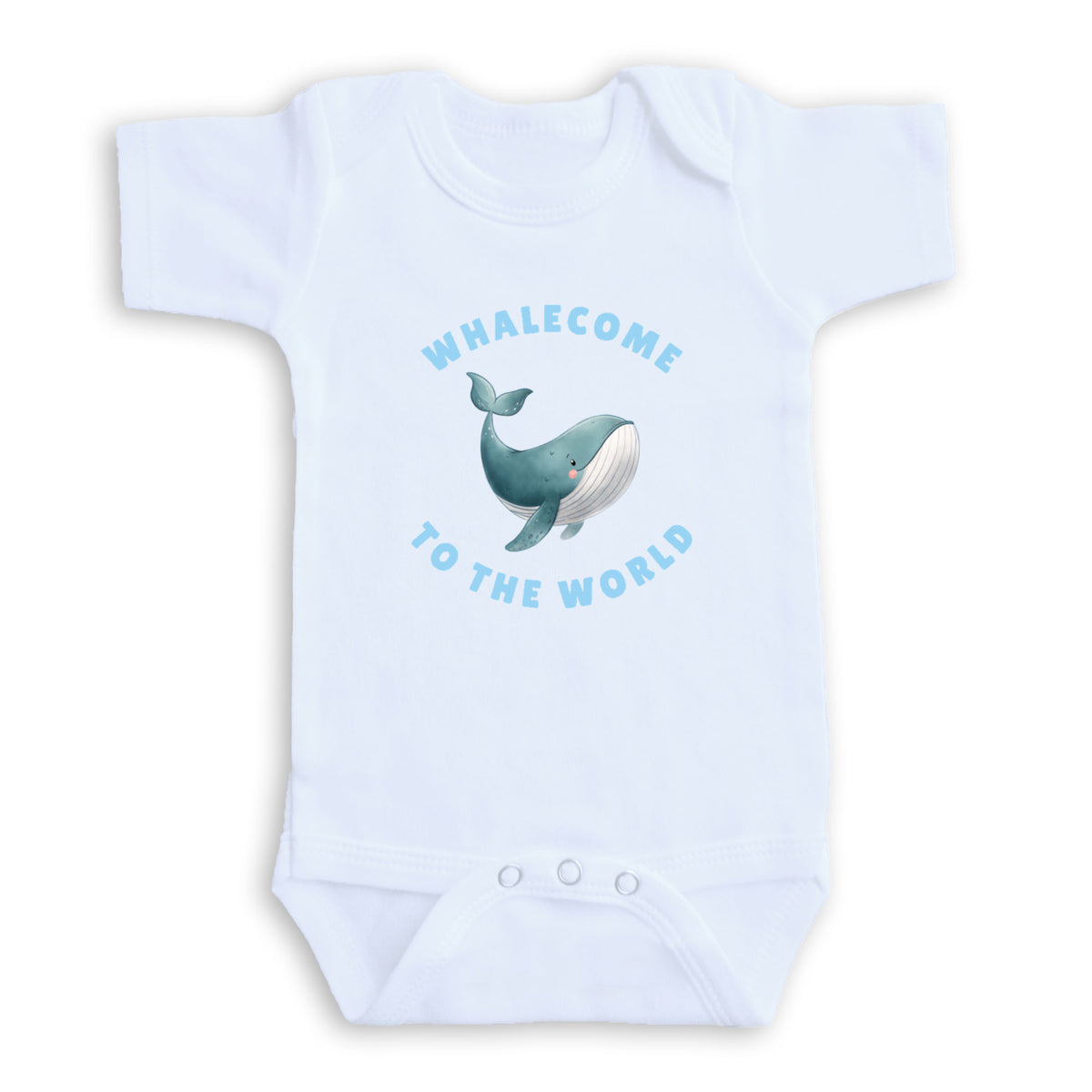 A white baby onesie with a graphic of a whale and the text "Whalecome to the World" printed on it.