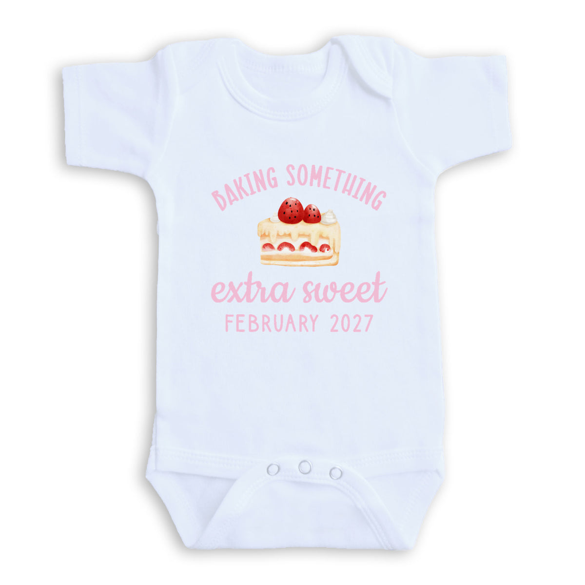 A white baby onesie with a pink graphic and text on it.