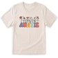 A white t-shirt with the word "AUNTIE" printed in a colorful, flower-like font.