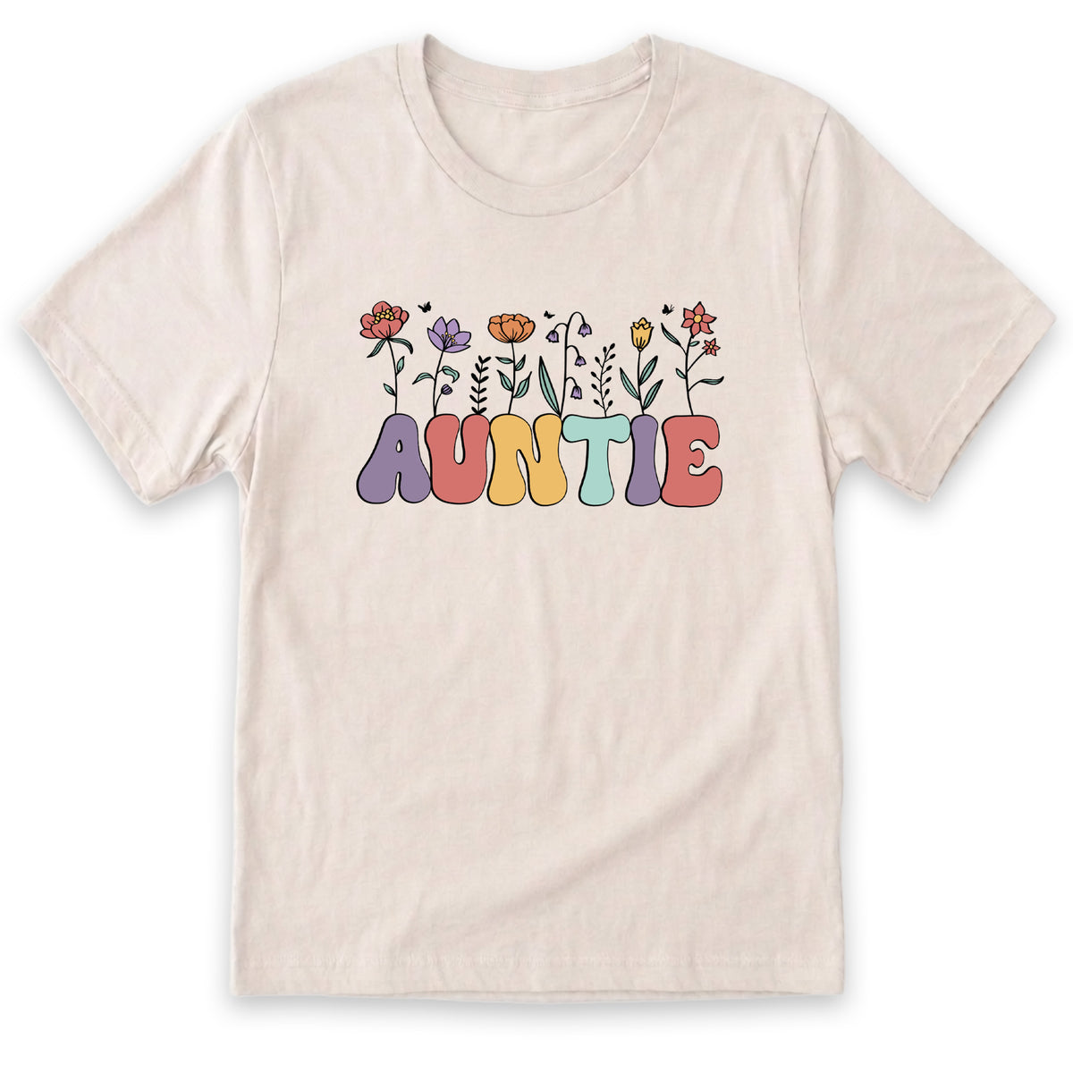 A white t-shirt with the word "AUNTIE" printed in a colorful, flower-like font.