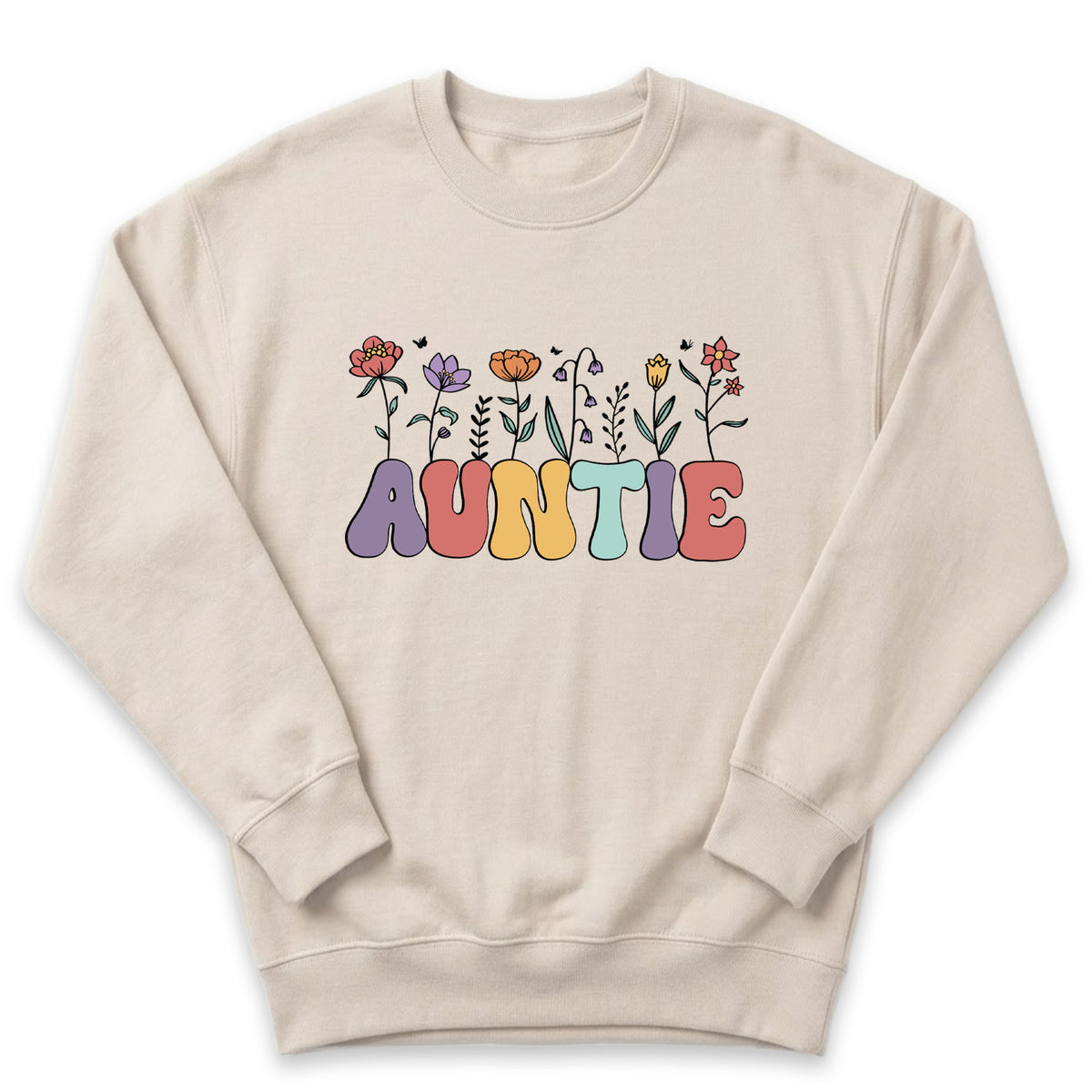 A beige sweatshirt with the word "Auntie" printed on it in a colorful, flower-like font.