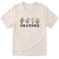 A white t-shirt with a graphic design featuring a row of colorful flowers and the word "GRANDMA" printed below them.