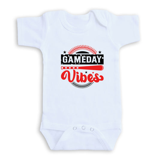 A white baby onesie with a graphic design on it.