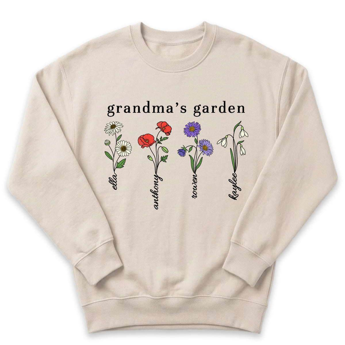 A beige sweatshirt with a graphic design featuring four different flowers and the text "Grandma's garden" printed on it.