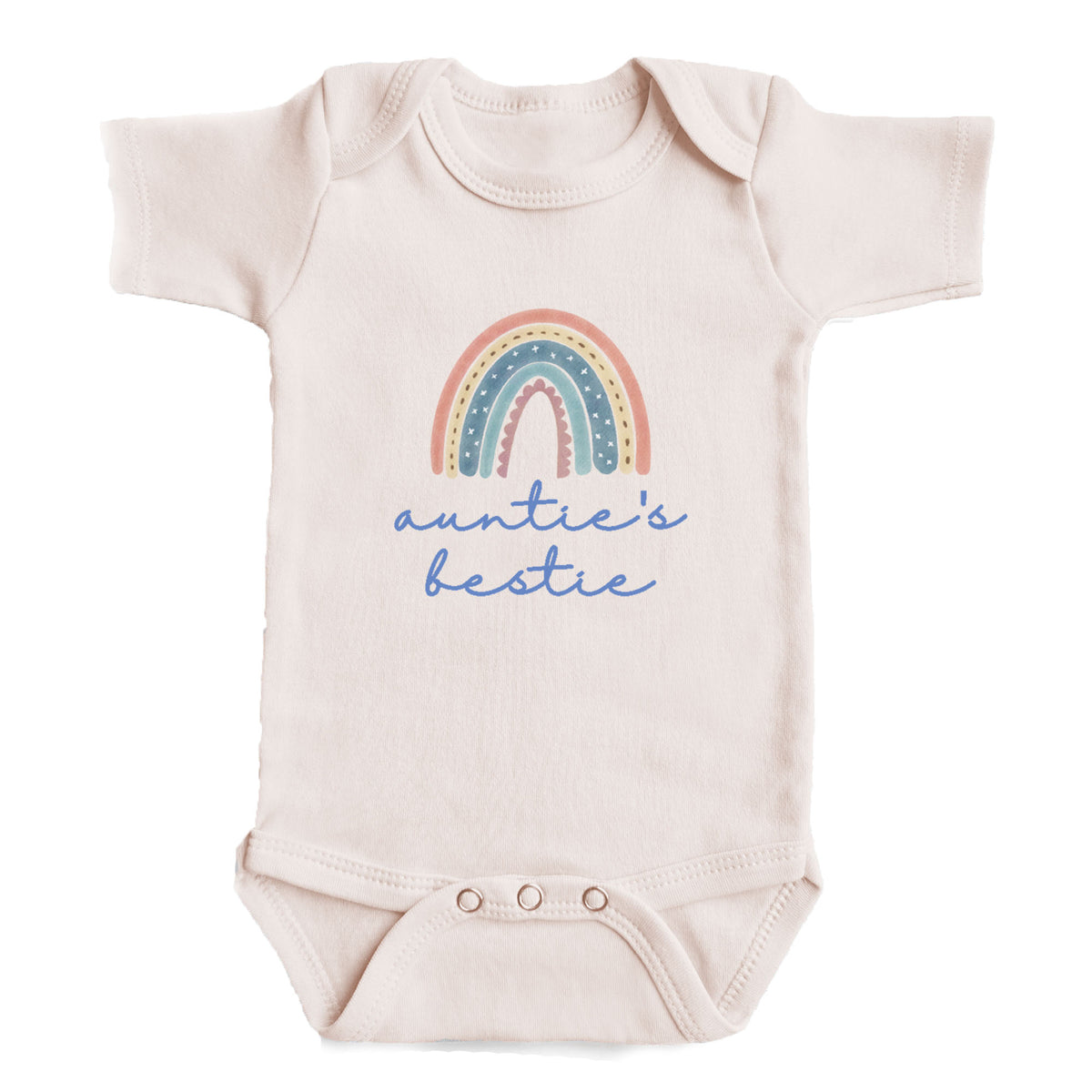 A baby onesie with a rainbow graphic and the text "auntie's bestie" printed on it.