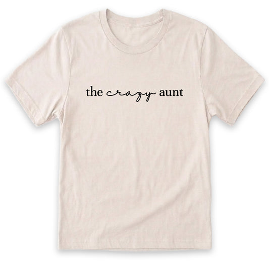 A white t-shirt with the text "the crazy aunt" printed on it.