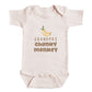 A baby onesie with a printed design of bananas and the text "GRANDPA'S CHUNKY MONKEY" printed on it.