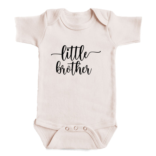 A baby onesie with the text "little brother" printed on it.