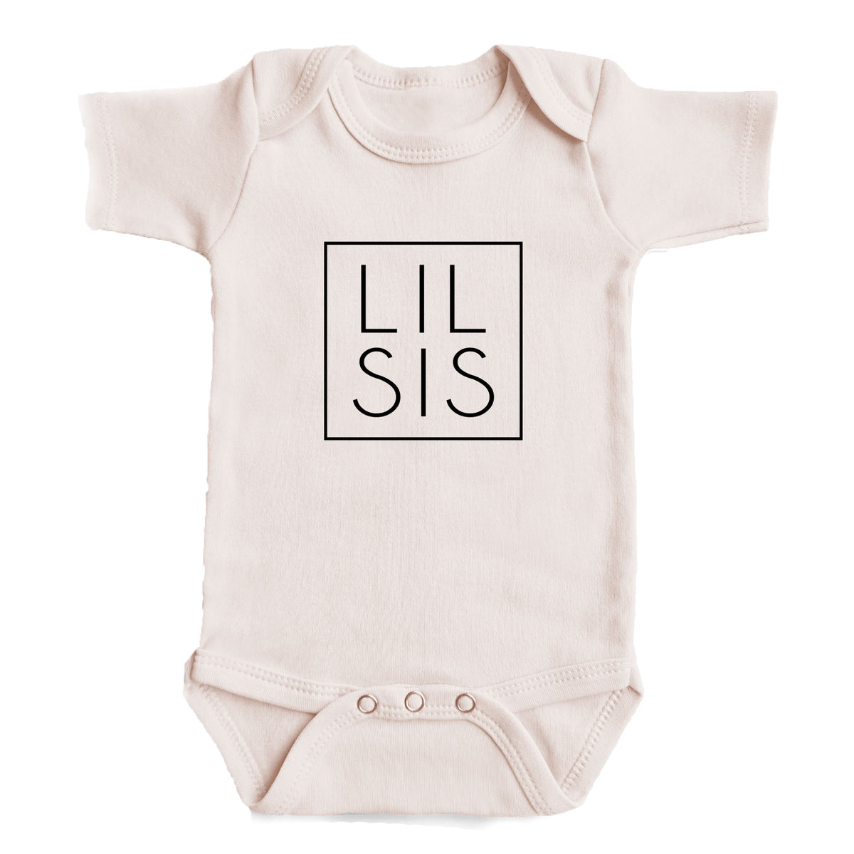 A baby onesie with the text "LIL SIS" printed on it.