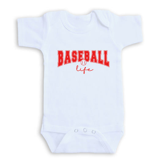 A white baby onesie with the text "BASEBALL life" printed on it in red letters.