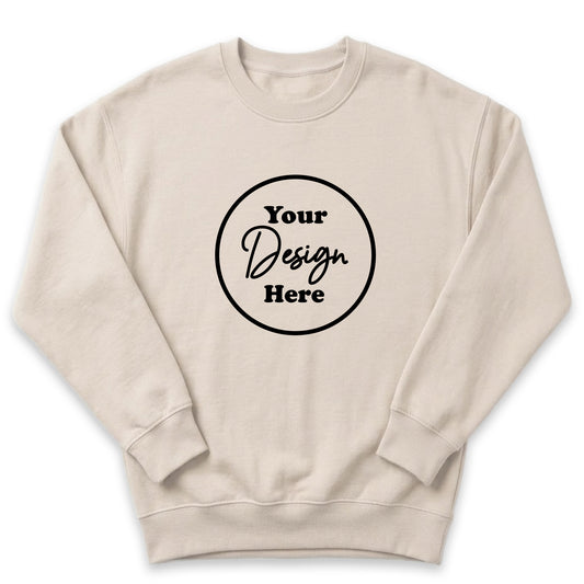 A beige sweater with a circular design featuring the text "Your Design Here" in black.