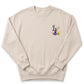 A beige sweatshirt with a colorful graphic design on the left side.
