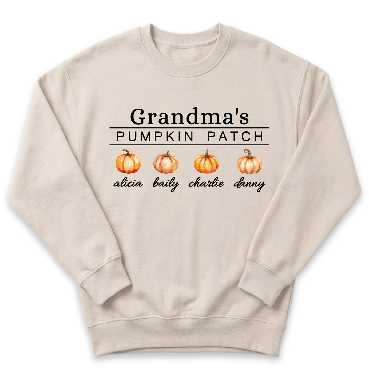 A beige sweater with the text "Grandma's PUMPKIN PATCH" printed on it, along with three orange pumpkins.