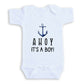 A white baby onesie with a blue anchor and the text "A HOY IT'S A BOY!" printed on it.