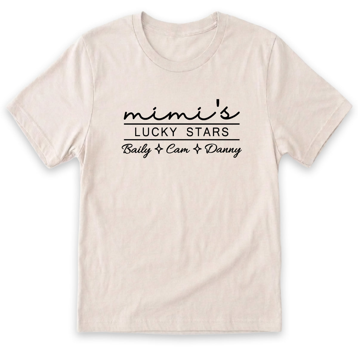 A beige t-shirt with the text "mini's LUCKY STARS" printed on it in a casual, handwritten style.