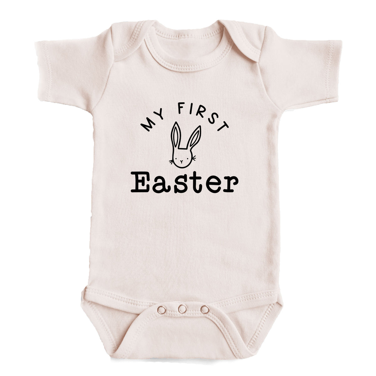 A baby onesie with the text "My first Easter" printed on it.