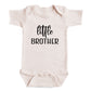 A baby onesie with the text "little BROTHER" printed on it.