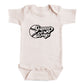 A baby onesie with the text "Game Day" printed on it.