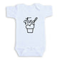 A white baby onesie with a black graphic design on the front.