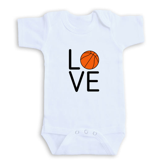 A white baby onesie with the word "LOVE" printed on it, featuring an orange basketball graphic.