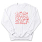 A white sweatshirt with a red graphic design featuring various Christmas-themed items such as a Santa hat, gift boxes, candy canes, and a snowman. The text "merry and bright" is written below the design.