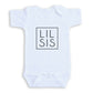 A white baby onesie with the text "LIL SIS" printed on it.