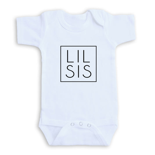 A white baby onesie with the text "LIL SIS" printed on it.