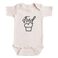 A baby onesie with a simple black graphic design on the front.
