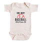 A baby onesie with the text "IN MY BASEBALL ERA" printed on it.
