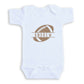 A white baby onesie with a football graphic and the name "ANDREW" printed on it.
