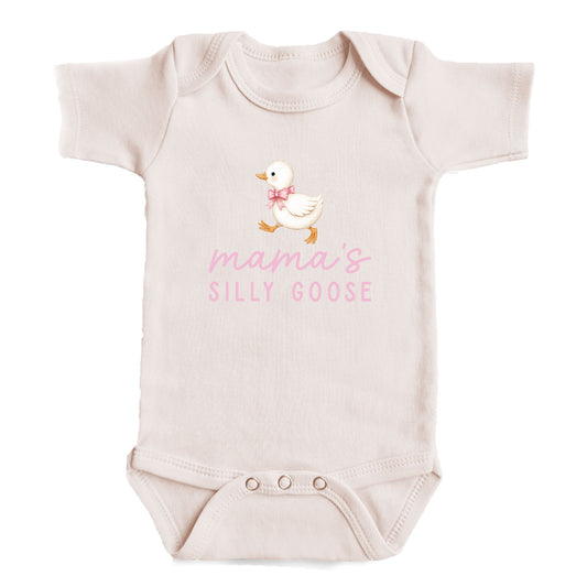 A baby onesie with a cartoon image of a duck and the text "mama's silly goose" printed on it.