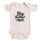 A baby onesie with the text "Big Brother Again" printed on it.