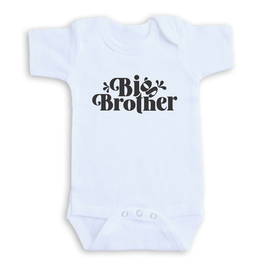 A white baby onesie with the text "Big Brother" printed on it.