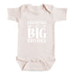 A baby onesie with the text "Promoted to Big Brother" printed on it.