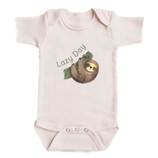 A baby onesie with a sloth graphic and the text "Lazy Day" printed on it.