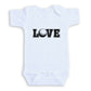 A white baby onesie with the word "LOVE" printed on it.