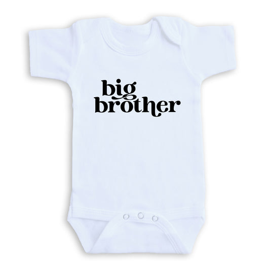 A white baby onesie with the text "big brother" printed on it.