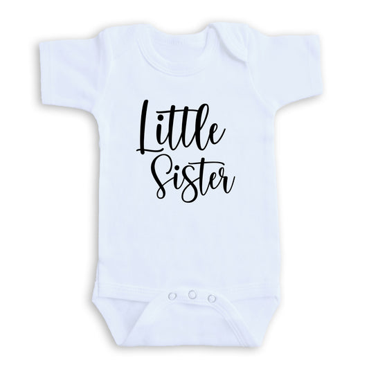 A white baby onesie with the text "Little Sister" printed on it.