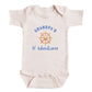 A baby onesie with the text "GRANDPA'S lil' adventurer" printed on it, along with a graphic of a steering wheel.