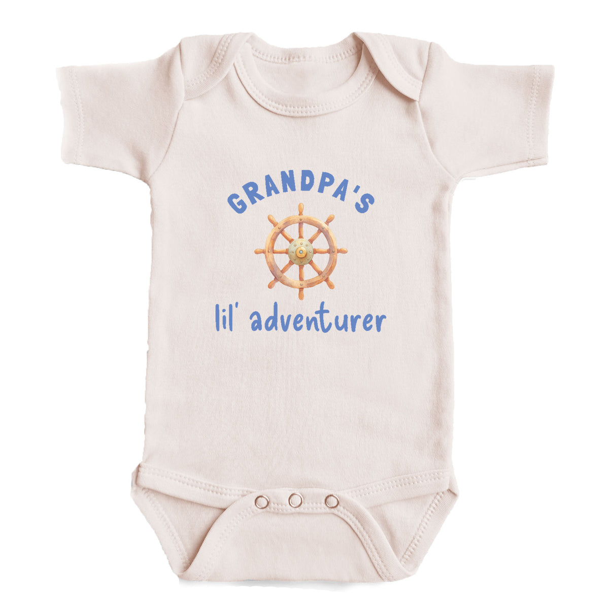 A baby onesie with the text "GRANDPA'S lil' adventurer" printed on it, along with a graphic of a steering wheel.